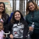 Citizens of Courage Natalie Ortiz and her two daughters Rachel and Sophie Martinez pose for a family photo with the two younger siblings outside Rady Children's Hospital.