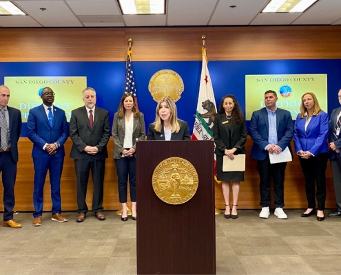 Photo of news conference announcing $25 Million in Stolen Funds Returned to Support San Diego Students.