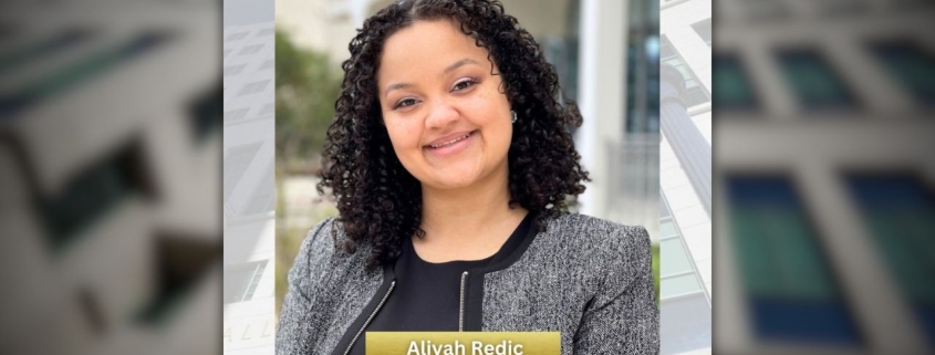 Photo of Deputy DA Aliyah Redic for Black History Month. The Hall of Justice Building is in the background.
