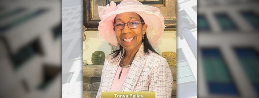 Photo of Legal Support Manager Tonya Bailey for Black History Month. The Hall of Justice building is in the background of the photo.