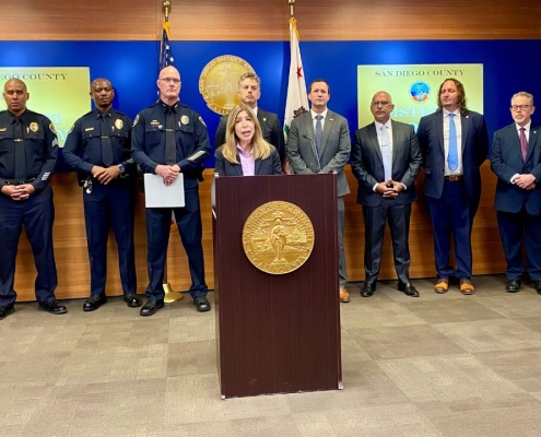 Photo of news conference about Operation Street Sweeper.