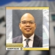 Photo of Deputy Crime Analysis Administrator Peter Villaver with his name and title below with a backdrop of the Hall of Justice building.
